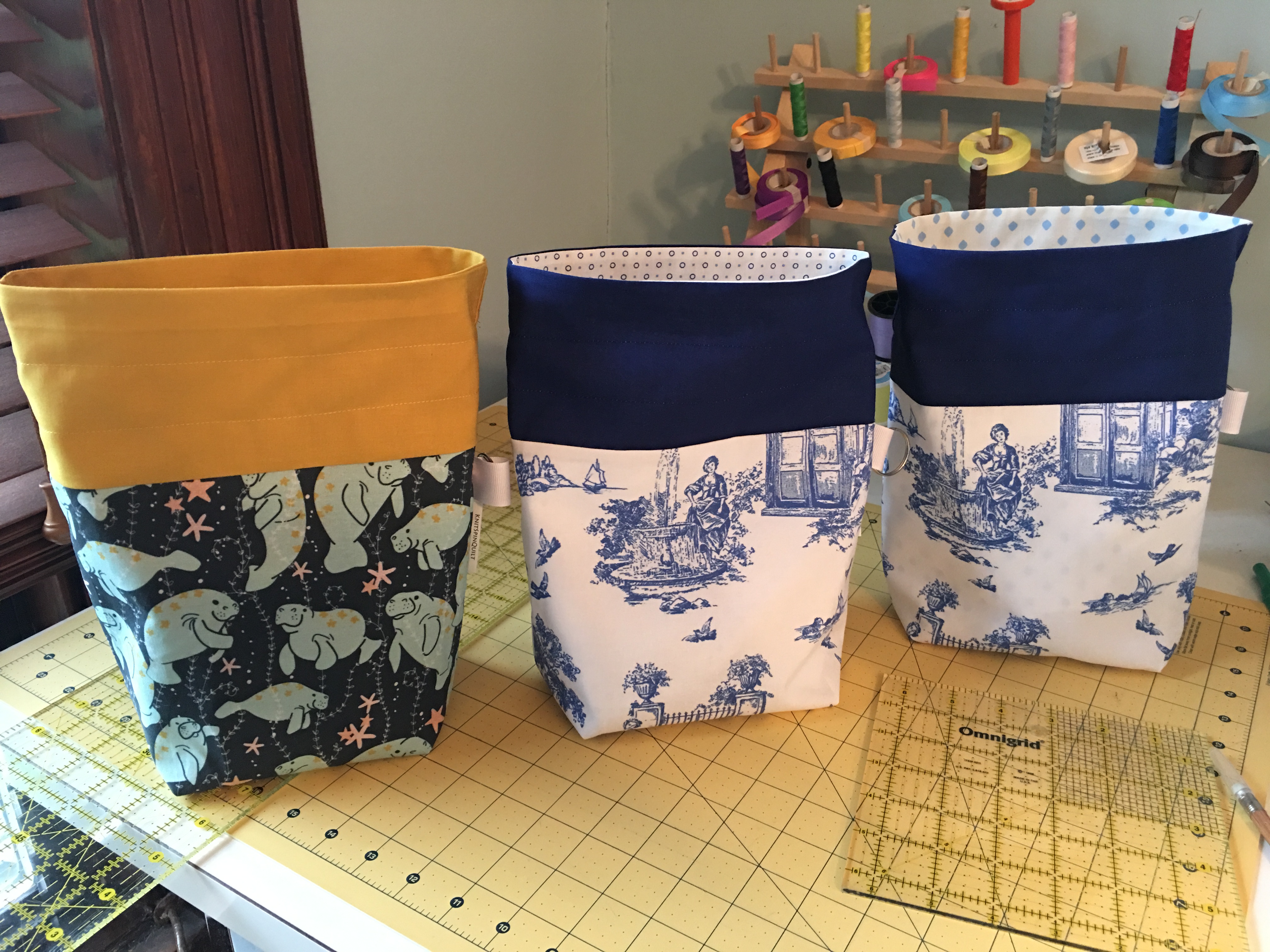 Three drawstring bags