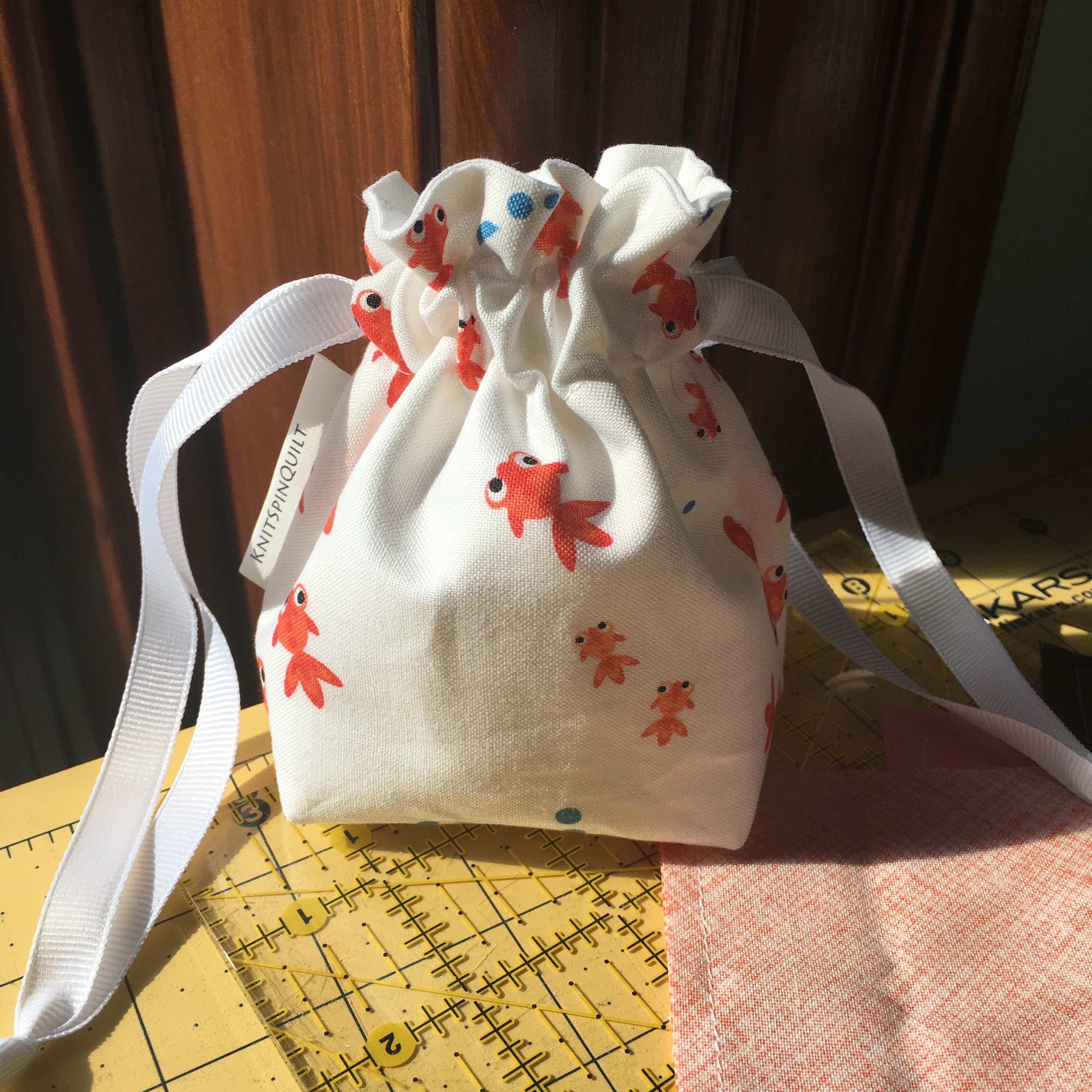 Goldfish dice bag
