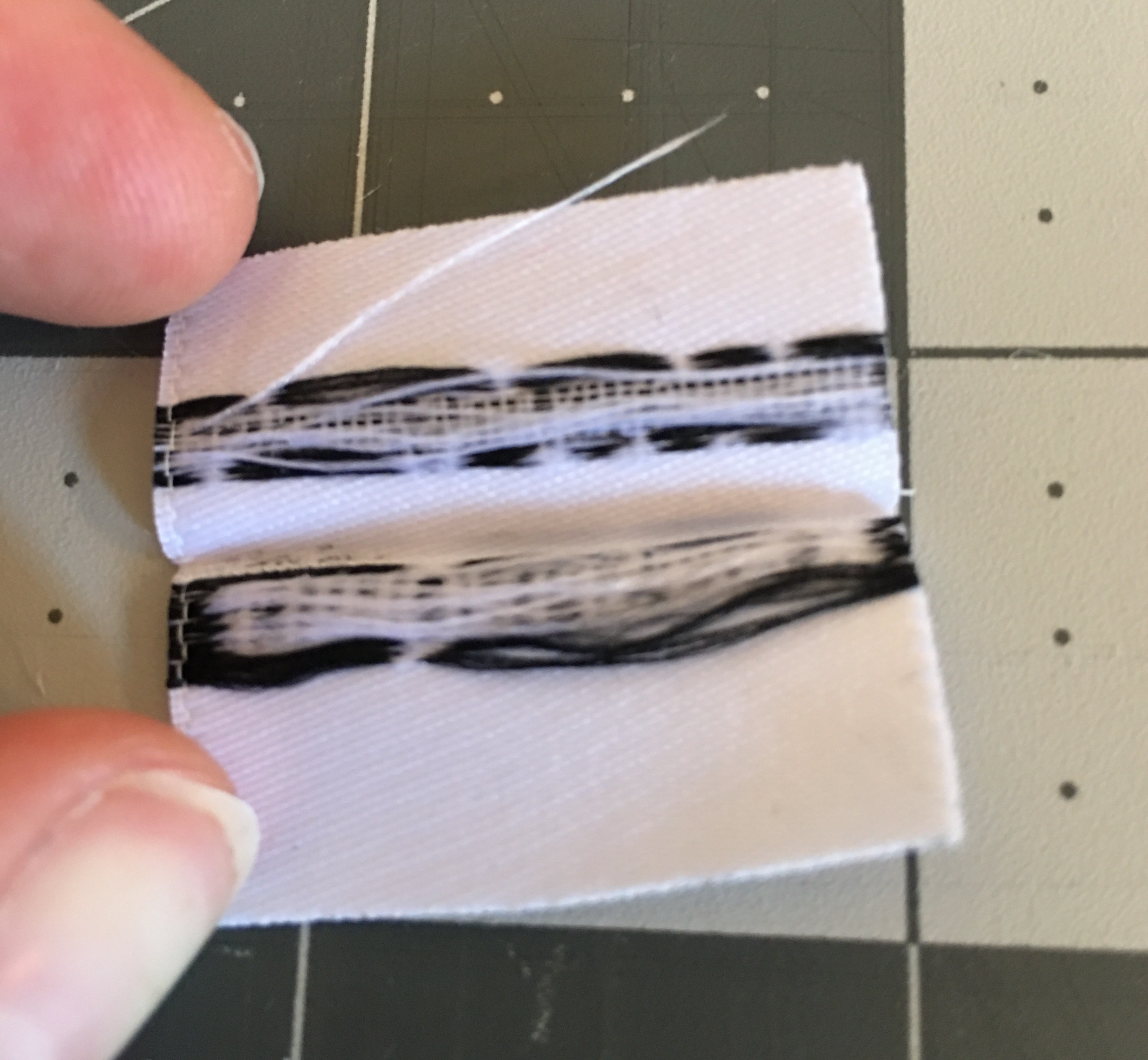 Image of the inside of a woven fabric label